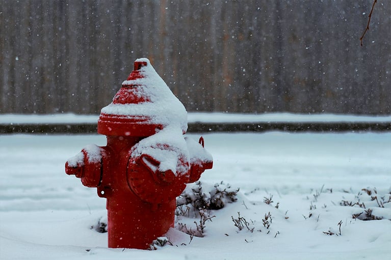 Snow covered fire hydrant in winter 